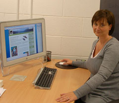 Jacquie updating the BAG web site which she manages.