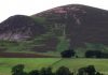 Tinto Hill as viewed from Lamington. Note the pink rock in the main body of the hill (felsite) and the black rock (basalt) protruding from a later intrusion.